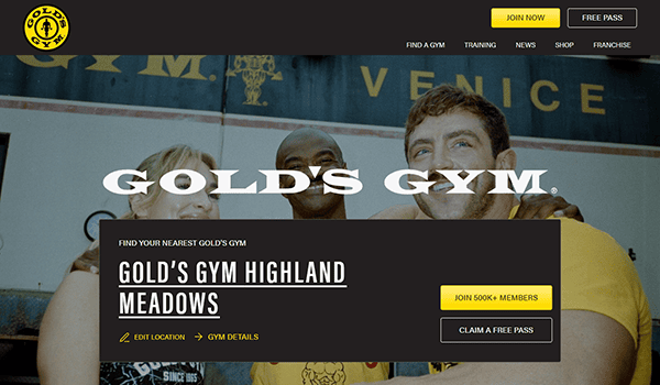 Three people grinning in front of a Gold's Gym sign. The website details Gold's Gym Highland Meadows, showcasing its standout gym website design, including location and membership information.