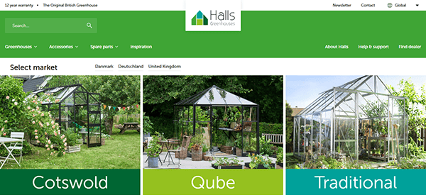 Screenshot of one of the best greenhouse websites, Halls Greenhouses, showcasing three stunning styles: Cotswold, Qube, and Traditional. Each greenhouse is elegantly displayed in a lush garden setting.