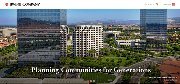 Aerial view of Irvine Spectrum District with modern buildings, trees, and hills in the background. Text reads: "Planning Communities for Generations". Explore more on commercial real estate websites.