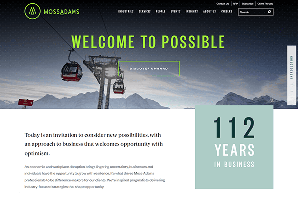 Screenshot of the Moss Adams website homepage featuring a cable car against mountains, a welcome message, and text highlighting 112 years in business. Recognized among the 20 Best CPA Websites, it showcases their long-standing expertise and commitment to excellence in the financial sector.