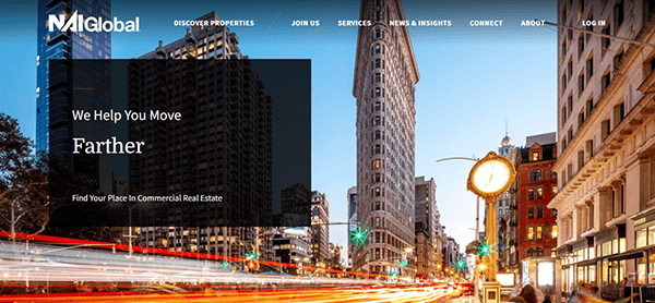 Explore the NAI Global webpage, a top-tier destination among real estate websites, showcasing a cityscape centered on premier commercial real estate services.