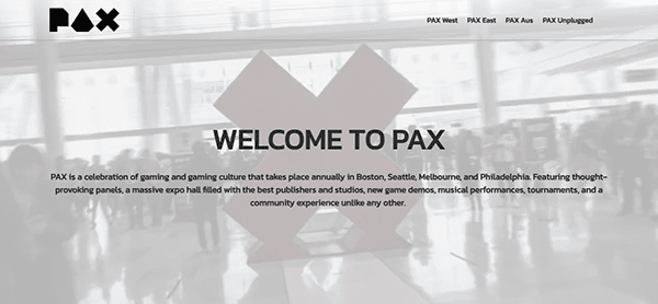 A "Welcome to PAX" sign greets attendees at the renowned gaming and culture event, set against a blurred crowd and the prominent PAX logo. Explore one of the top conference sites for an unforgettable experience!.