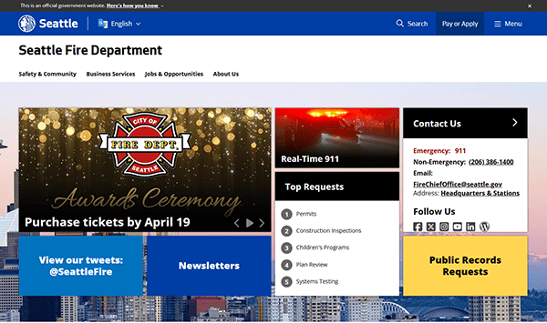 Screenshot of the Seattle Fire Department website showcasing an awards ceremony banner, navigation menu, social media links, and options for real-time 911 updates, permits, and public records requests. This top-tier site exemplifies best practices in Fire Department SEO.
