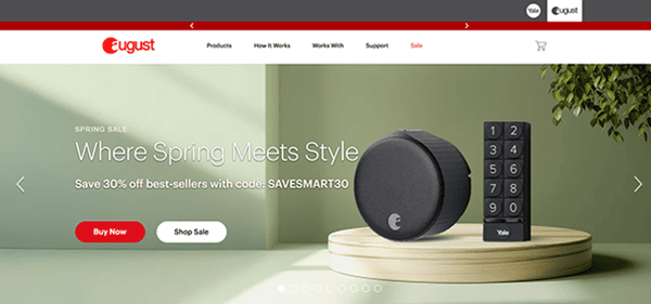 August website homepage showing a spring sale banner with a smart lock and keypad, offering 30% off best-sellers for your smart home with code SAVESMART30, alongside "Buy Now" and "Shop Sale" buttons.