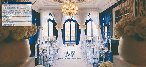 A luxurious wedding ceremony setup with white flowers, candles, elegant chairs, and blue drapery in a bright, ornate room. A chandelier hangs above and a party planning menu inspired by the best wedding planner websites is visible on the left.