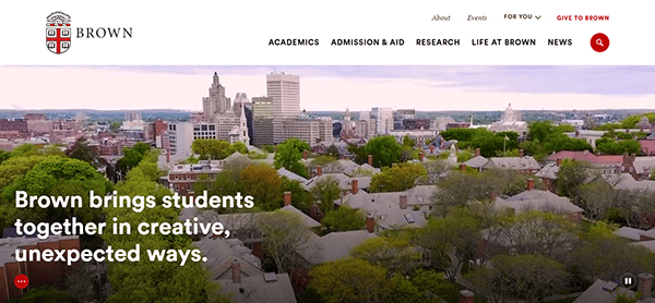 Aerial view of Brown University campus with downtown Providence skyline in the background; text reads, “Brown brings students together in creative, unexpected ways—just like the top school websites inspire connection.”.