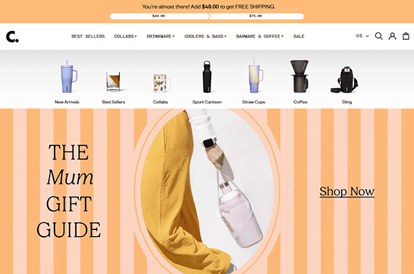 Website homepage featuring a banner for "The Mum Gift Guide" with a hand holding a pink bottle; navigation bar showcases drinkware and accessories—perfect inspiration for those seeking Small Business Website Examples.