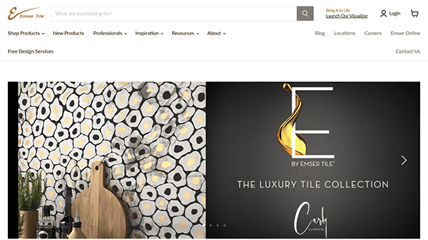 A website homepage for Emser Tile displays navigation links, a floral-patterned tile backsplash with kitchenware, and a promotional banner for a luxury tile collection—offering tile inspiration found on the best tile websites.