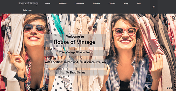 Two smiling women stand in front of racks of vintage clothing. Text overlay reads "House of Vintage" with store details, locations in Portland, OR and Vancouver, WA—one of the best vintage clothing spots featured on top vintage clothing websites.
