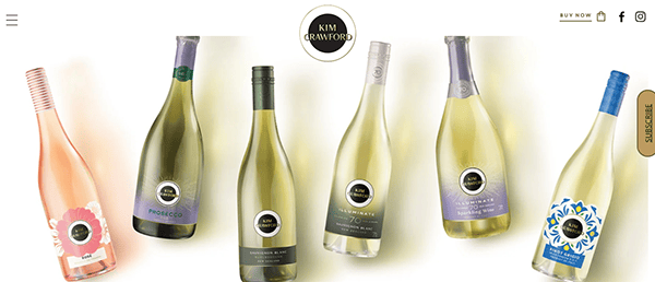 Five bottles of Kim Crawford wine—including rosé, prosecco, sauvignon blanc, and sparkling—stand upright against a white background, styled with the elegance often featured on the best winery websites.