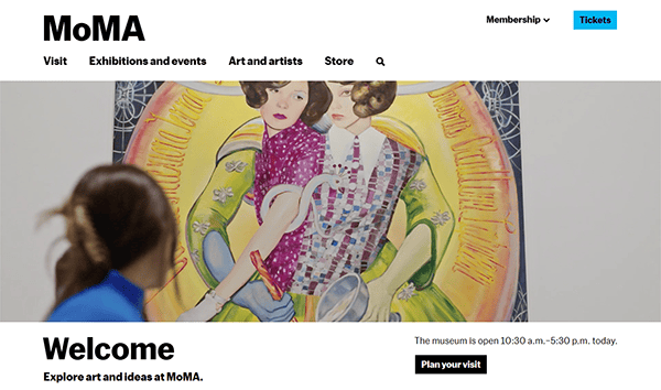 A person looks at a colorful painting of two women at the Museum of Modern Art (MoMA), with exhibition and ticket options showcased on one of the best museum websites in the header.