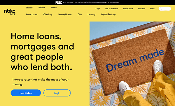 A person stands on a doormat that says "Dream made" beside a bright yellow wall with text about home loans, mortgage options, and a blue "See Rates" button—perfect inspiration for the best mortgage websites.