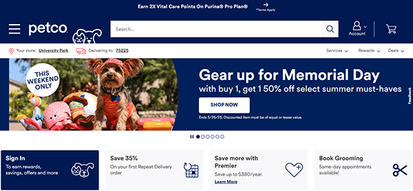 Screenshot of the Petco homepage, one of the best pet shop websites, featuring a Memorial Day promotion: "Buy 1, get 1 50% off select summer must-haves," with a dog in summer attire and various navigation options.
