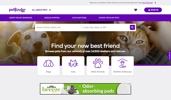 Screenshot of the Petfinder homepage, one of the best pet adoption websites, featuring a search bar, options for dogs, cats, other animals, shelters & rescues, plus a banner ad at the bottom.