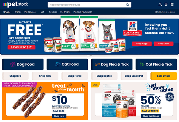 Screenshot of a pet store website homepage showcasing pet food deals, categories for dog and cat supplies, and promotional banners—an example of engaging pet shop website design.