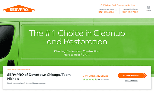 A green SERVPRO van boasts "The #1 Choice in Cleanup and Restoration." As one of the top local service companies, it prominently displays contact info for its Chicago location and highlights its 24/7 service details at the bottom.