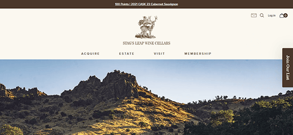 Screenshot of Stag's Leap Wine Cellars website homepage, showcasing impressive winery website design with navigation menus, a mountain landscape image, and options to acquire, visit, or join membership.