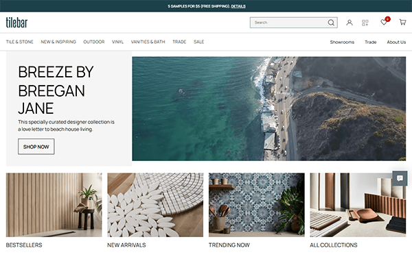 Screenshot of the Tilebar website homepage, a top choice among best tile websites, featuring a coastal aerial photo, menu navigation, and product sections like Bestsellers, New Arrivals, Trending Now, and All Collections for endless tile inspiration.