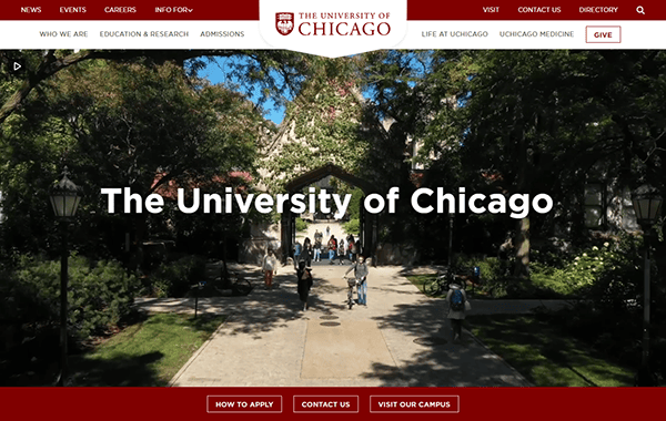 Students walk along a tree-lined pathway toward a stone arch on the University of Chicago campus, featured prominently among the best school websites, with "The University of Chicago" displayed in the center.
