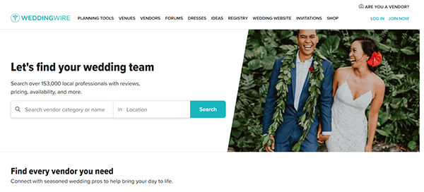 A smiling couple in wedding attire stands outdoors, holding hands. WeddingWire, one of the best wedding websites, offers a vendor search tool with options to log in or join.