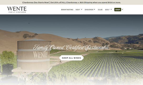 A vineyard landscape with rolling hills, a large water tower labeled “Wente,” and text promoting Wente Family Vineyards, online wine shopping, and showcasing winery website design inspiration.