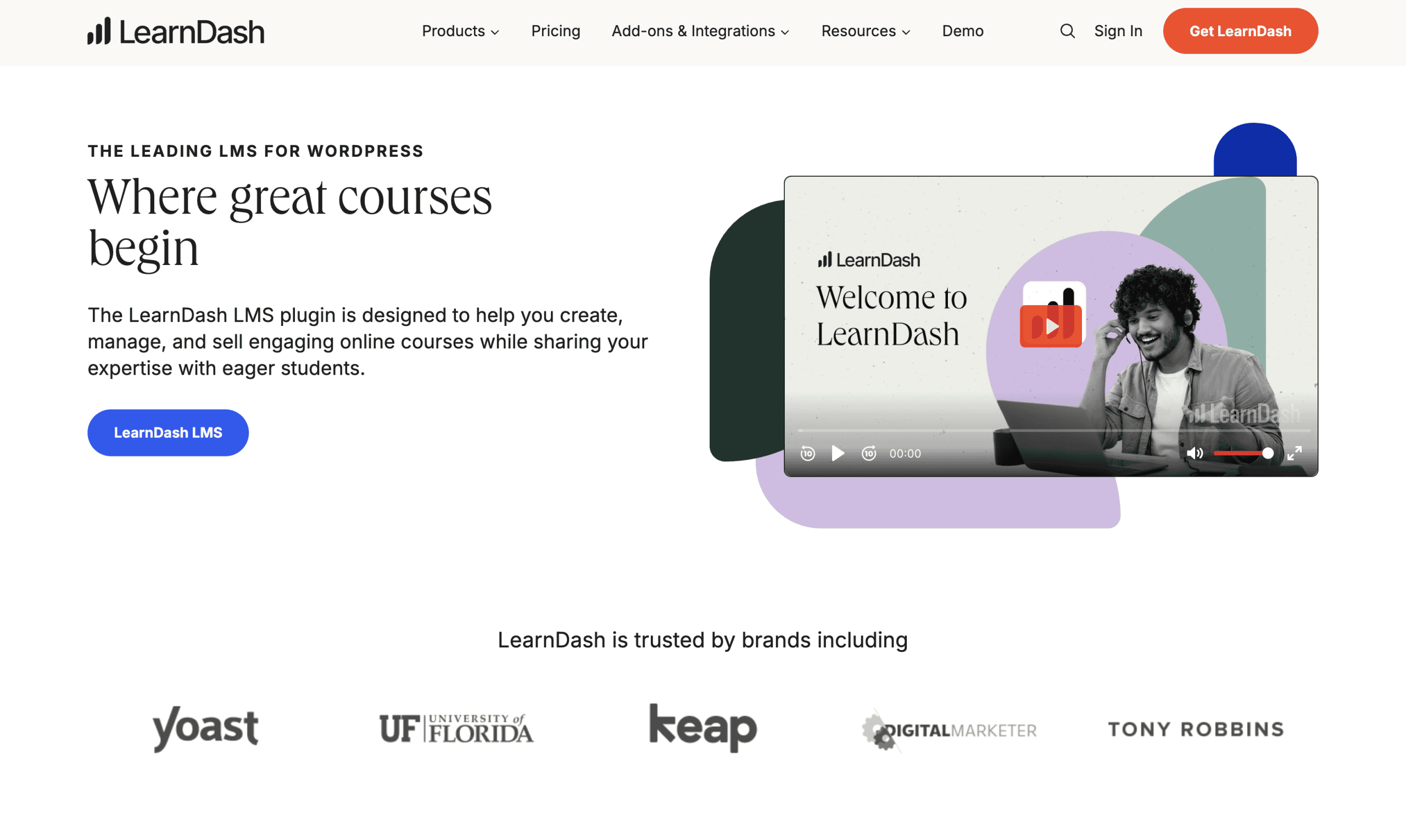 Screenshot of the LearnDash website homepage showing a headline about online courses, a video thumbnail, and logos of brands that use LearnDash.