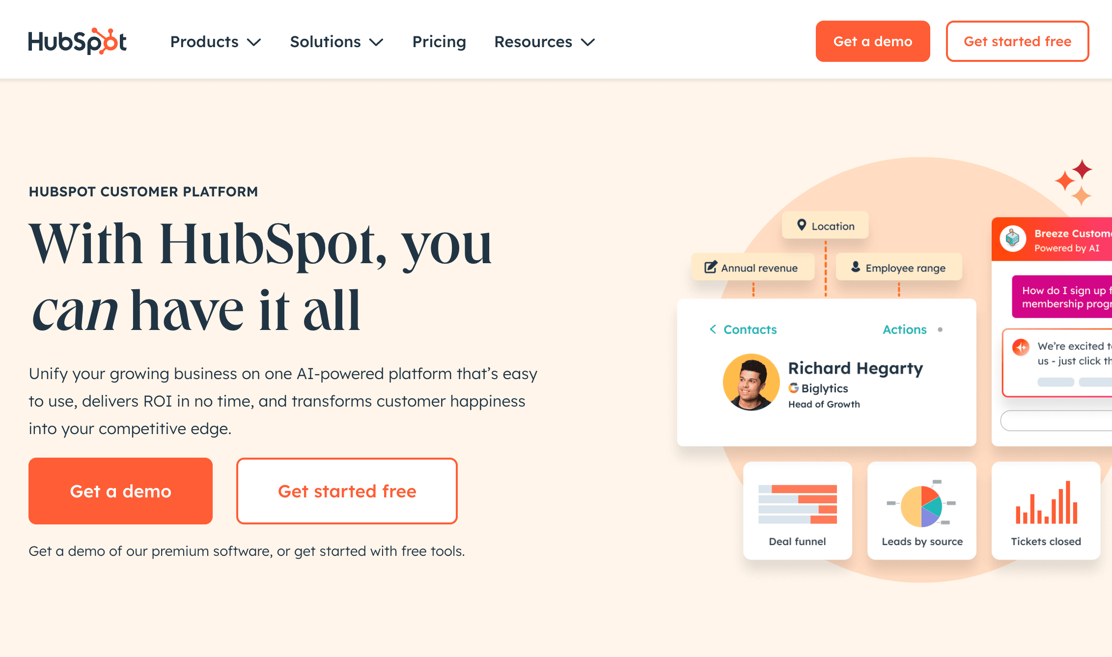 Screenshot of HubSpot's homepage featuring a headline about their AI-powered customer platform, call-to-action buttons for getting started, and illustrated sample dashboard elements.