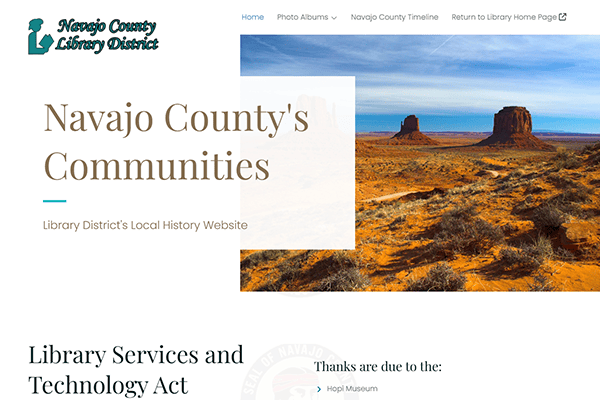 Screenshot of the Navajo County Library District website featuring a desert landscape photo and headings about Local History and library services.