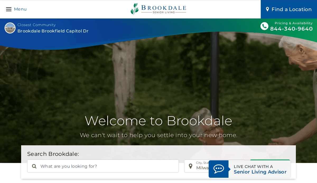 Screenshot of the Brookdale Senior Living website homepage, featuring a welcome message, search bar, contact number, and a live chat option with a senior living advisor. The senior living website displays a blurred outdoor background.