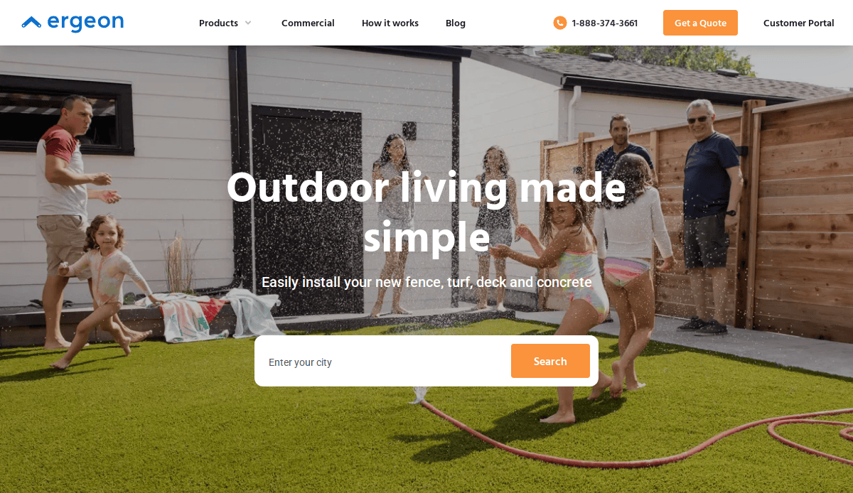 Adults and children play together in a sunny backyard, running through a water sprinkler on green grass beside a white house and sturdy fence, with a search bar overlay and the text “Outdoor living made simple.”.