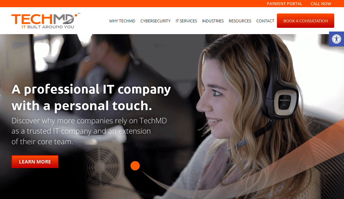 Screenshot of TechMD’s website homepage featuring a smiling woman wearing a headset at her computer. The text reads: “A professional MSP with a personal touch.” Navigation menu and call-to-action buttons are visible.
