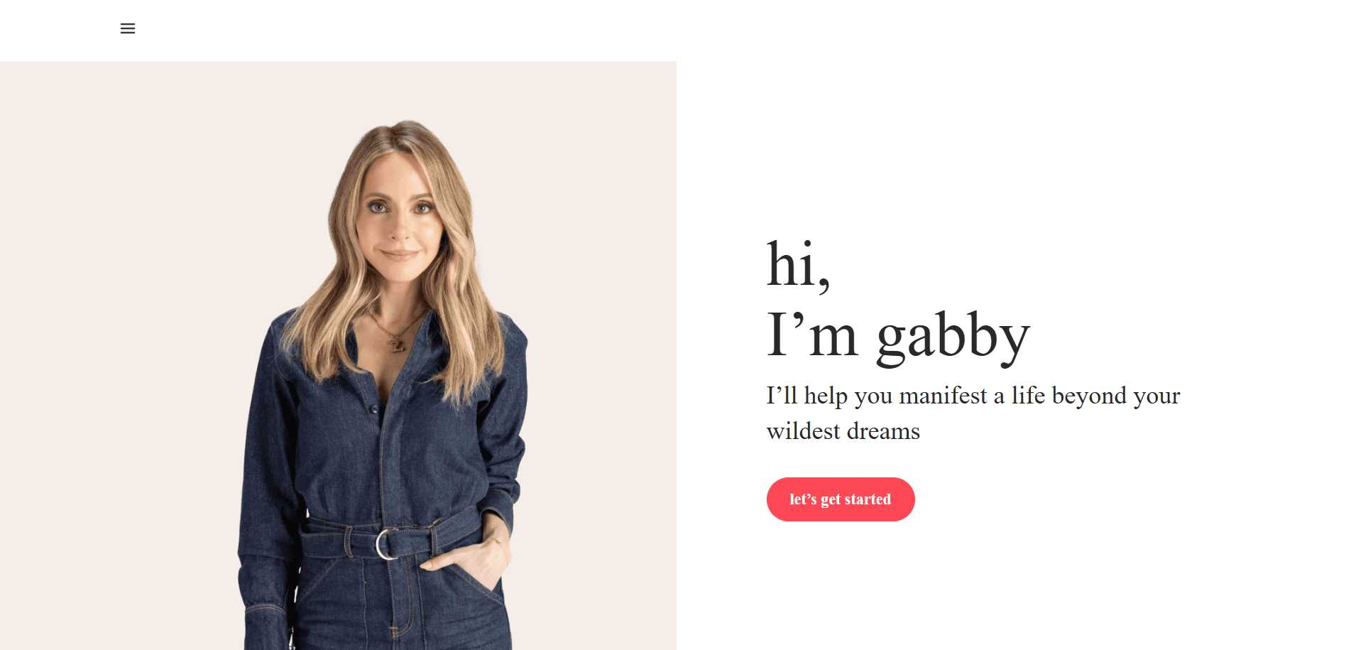 A woman with long blonde hair, wearing a dark denim jumpsuit, stands smiling next to text that says, hi, I’m Gabby. As seen on a life coach website, Ill help you manifest a life beyond your wildest dreams—just click the pink lets get started button!.