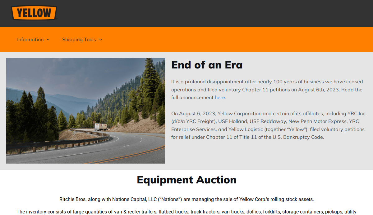 Screenshot of the Yellow Corporation transportation website announcing its shutdown and Chapter 11 bankruptcy filing, with a curved highway in a forested mountain area shown in the header image. Text also mentions an equipment auction.