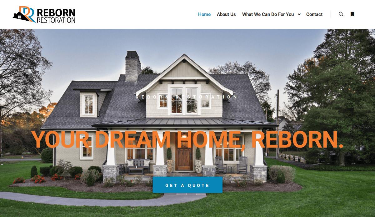 A large, two-story house with a front porch and gabled roof, surrounded by trees, is featured on the homepage of Reborn Restoration’s website blueprint. The text reads, YOUR DREAM HOME. REBORN. with a GET A QUOTE button below.