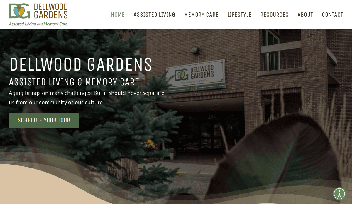 Screenshot of the Dellwood Gardens senior living website showing their main entrance sign and tagline, Assisted Living & Memory Care. A green button says Schedule Your Tour. Plants partially frame the foreground, highlighting thoughtful website design.