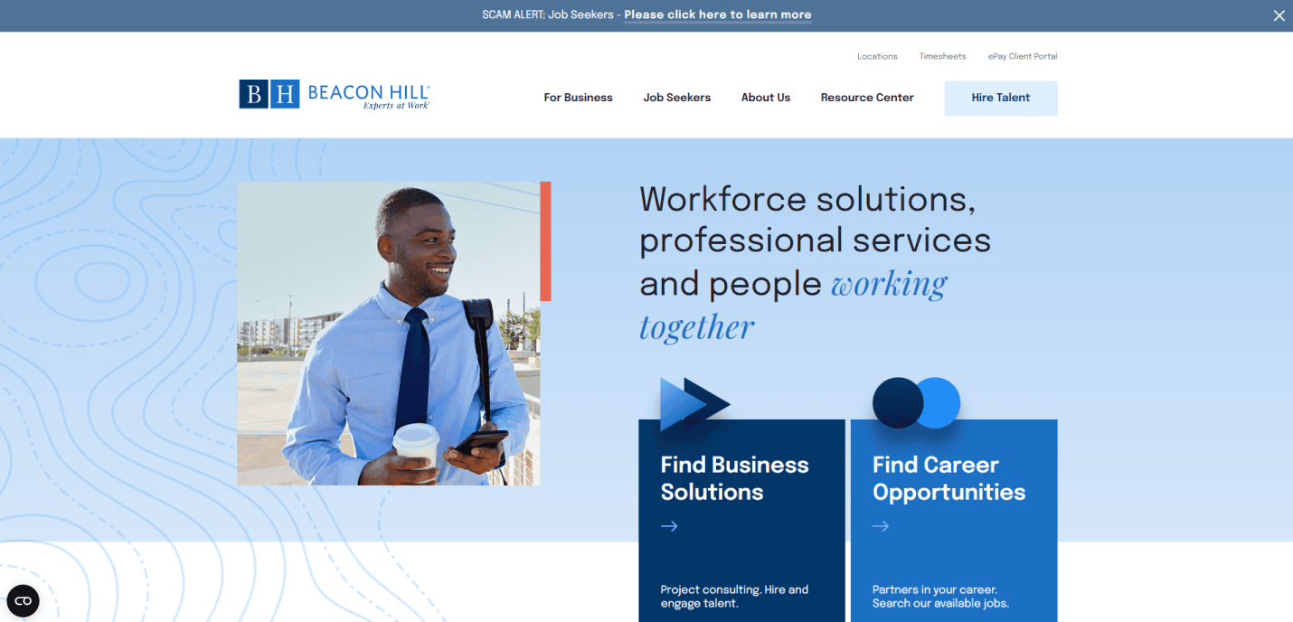 A smiling man in a light blue shirt and tie holds a smartphone outdoors. The Beacon Hill recruitment agency website offers workforce solutions, along with a guide to business solutions or career opportunities on a blue and white background.