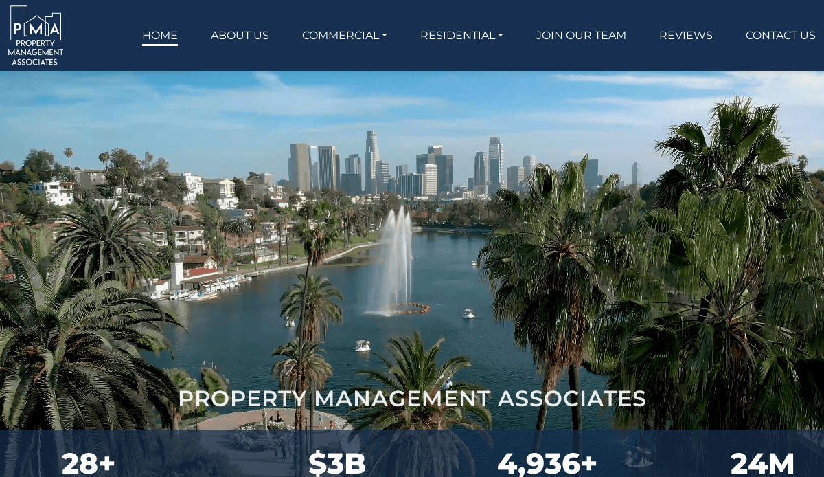 A cityscape with palm trees, a lake, and fountains in the foreground, downtown Los Angeles buildings in the background, and a navigation bar for a property management website by Property Management Associates at the top.