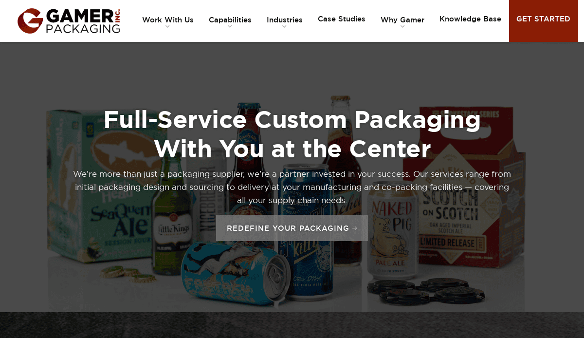A website header for Gamer Packaging Inc. features beverage packaging designs, including cans and cartons, behind bold text promoting high-performing custom packaging solutions and a prominent Redefine Your Packaging button.