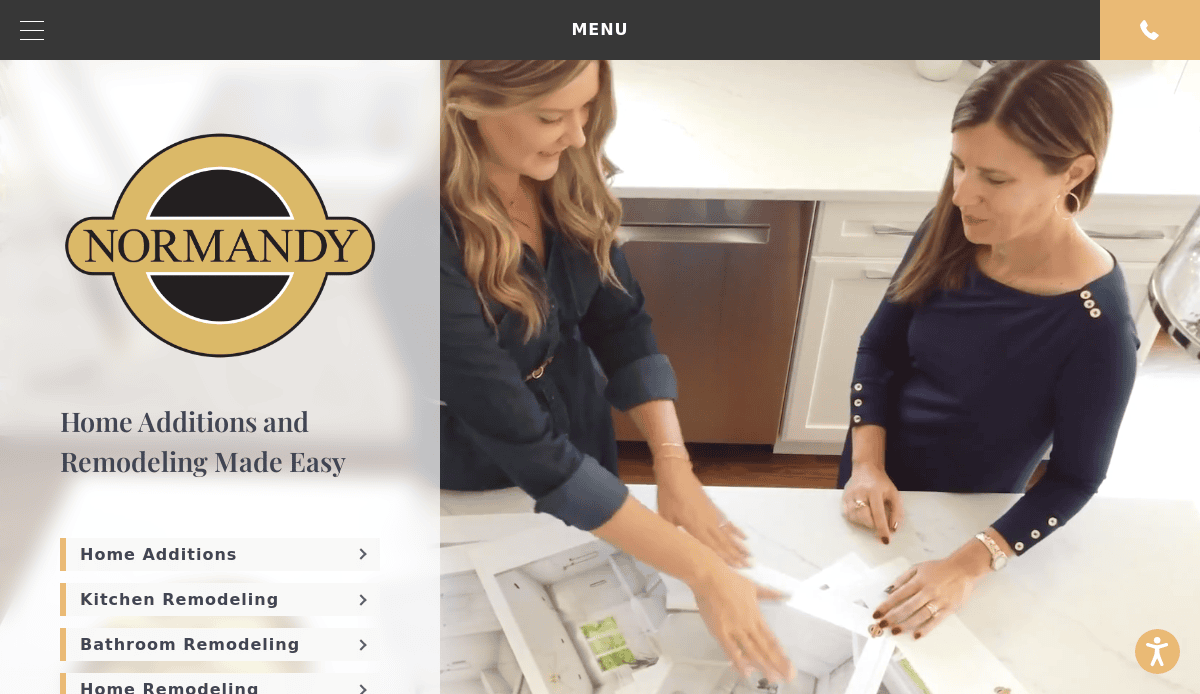 Two women review floor plans on a kitchen counter. On the left is the Normandy logo with text: Home Additions and Remodeling Made Easy, plus buttons for Home Additions, Kitchen Remodeling, and Bathroom Remodeling—all showcased on a modern kitchen remodeling website.