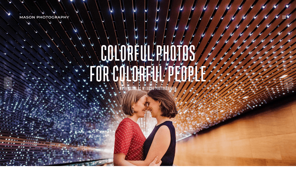 Two women stand close together smiling under a ceiling of glowing blue and white lights. The photo features text that reads Colorful photos for colorful people and is labeled Mason Photography, perfect inspiration for any wedding website guide.