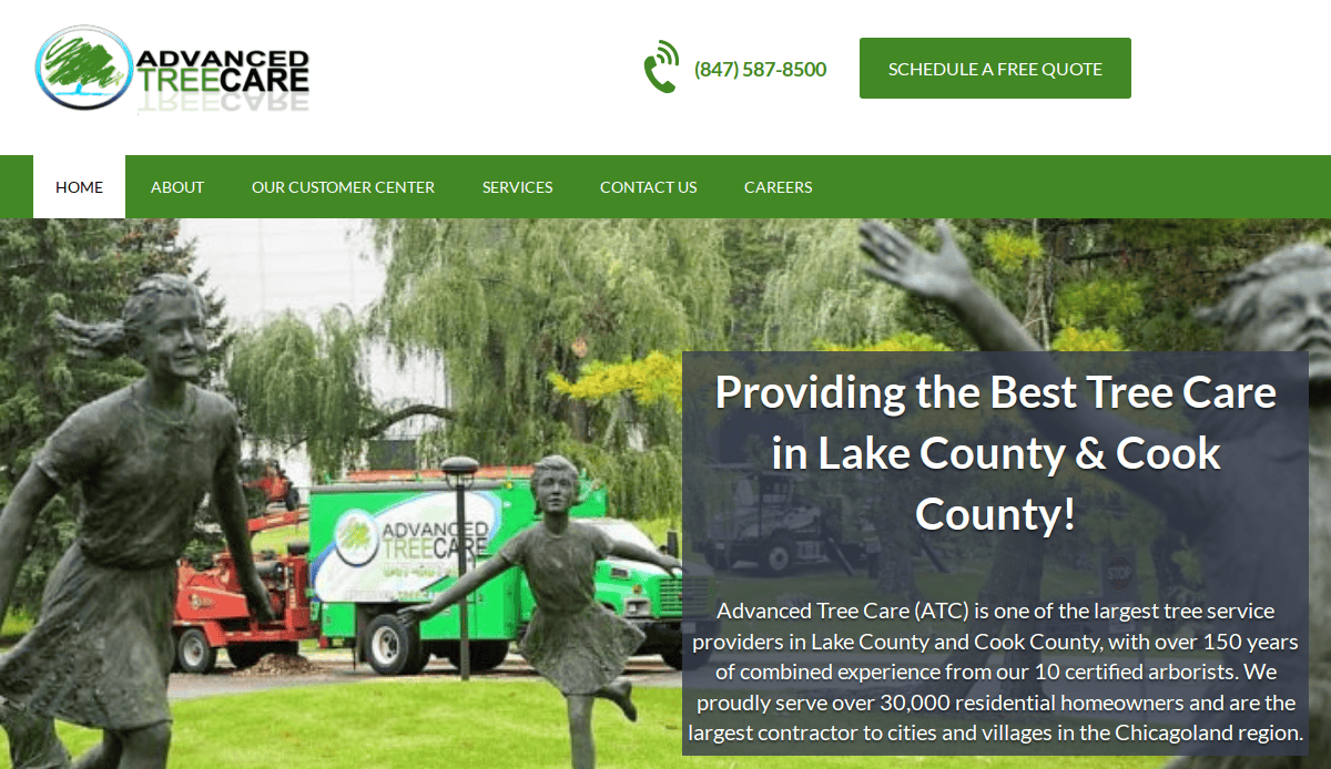 Advanced Tree Care website homepage showing a green banner, company logo, contact number, free quote button, and a background image of tree service vehicles with a sculpture of children playing in a park setting.