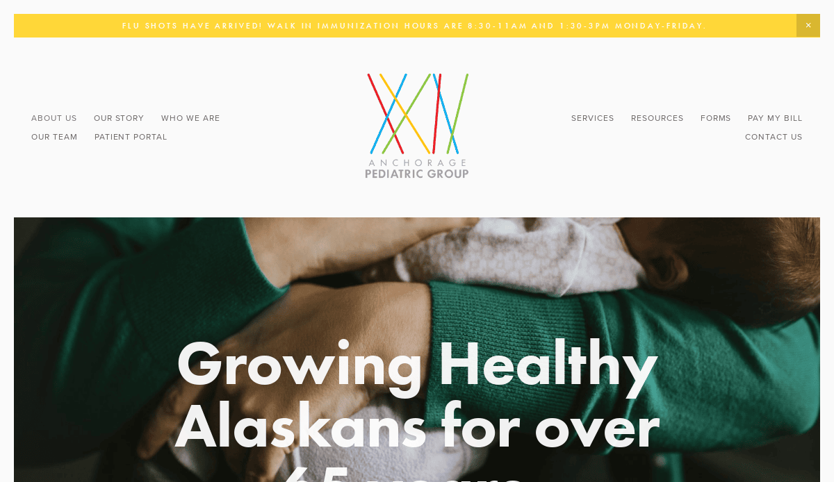 Screenshot of the Anchorage Pediatric Group website homepage, featuring their logo, navigation menu, and a banner about flu shot hours. The background shows an adult holding a small child. Text reads Growing Healthy Alaskans for over 45 years.