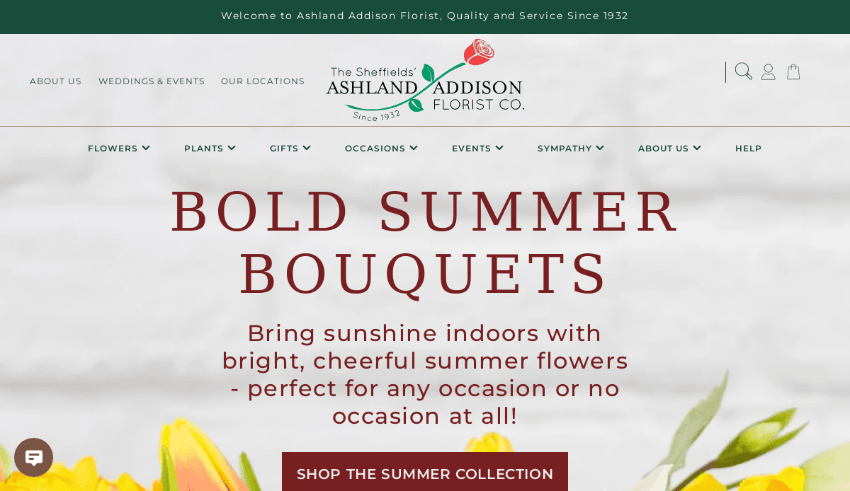 Screenshot of Ashland Addison Florist Co. website featuring a banner that says Bold Summer Bouquets with a call to shop the summer collection. The background includes colorful flower petals at the bottom.