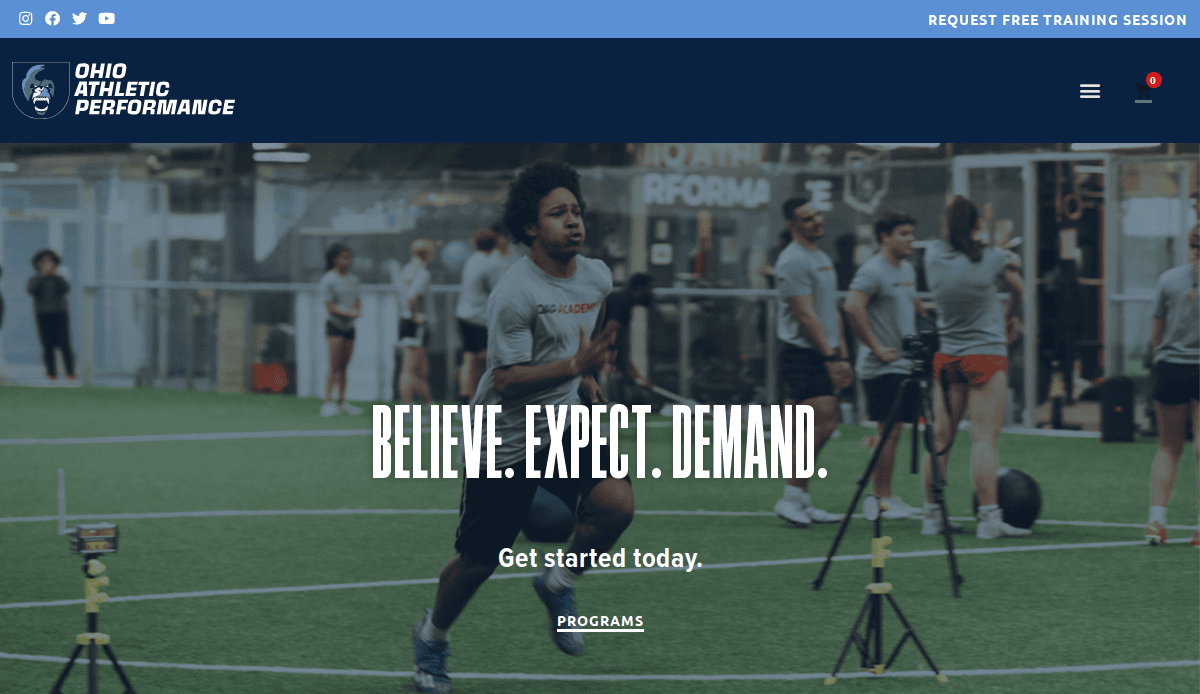 A young man sprints indoors on turf while others watch and exercise; BELIEVE. EXPECT. DEMAND. is overlaid, with Get started today. and a PROGRAMS button below. The Ohio Athletic Performance logo is in the corner.