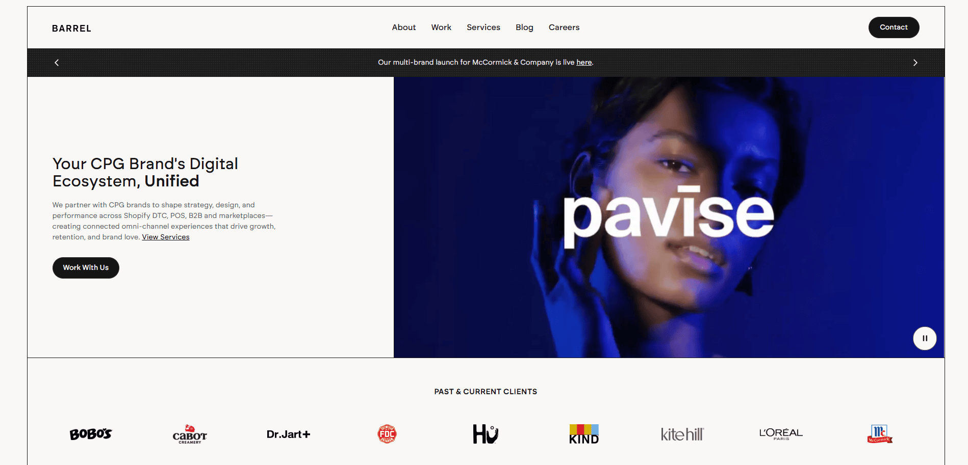 Screenshot of Barrel’s homepage. Left side: “Your CPG Brand’s Digital Ecosystem, Unified” text and a “Work With Us” button. Right side: woman’s face in blue light with “pavise” text. Client logos are displayed at the bottom.
