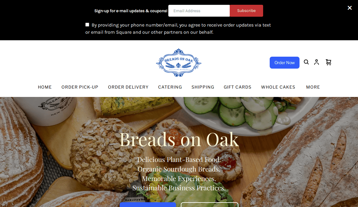 Screenshot of the Breads on Oak bakery website homepage, showing rustic loaves, sliced bread, and vegetables, with a signup banner, logo, navigation menu, and “Breads on Oak” text overlaid.
