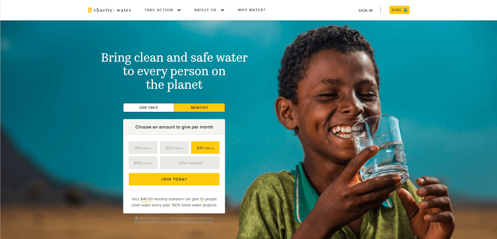 A smiling boy holds and drinks a glass of clear water against a bright blue sky. Text on the image promotes giving to provide clean, safe water globally, with donation options and a “Join Today” button displayed.
