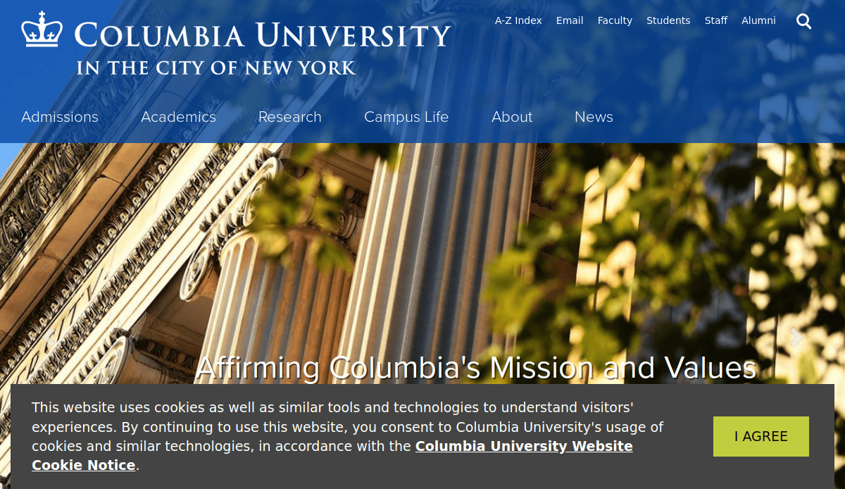 Screenshot of the Columbia University website homepage, showing university name, columns of a building, navigation menu, and a cookie consent notice with an I AGREE button at the bottom.