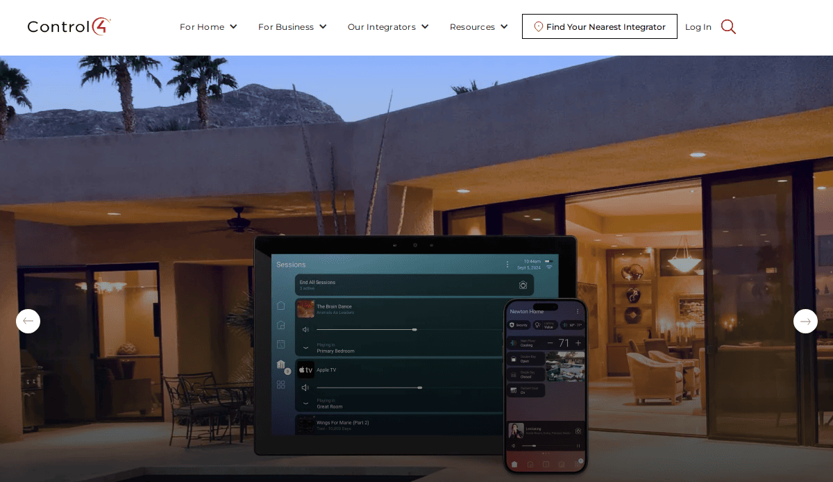 A modern home with large windows and patio lighting at dusk; in the foreground, a tablet and smartphone display a smart home control interface.