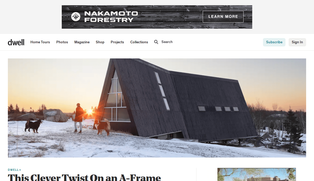 A modern black A-frame house stands on a snowy hillside at sunset. Two people, one with two dogs, walk in front of the house. The sky is clear, and trees are visible in the background. A Nakomoto Forestry banner is above.